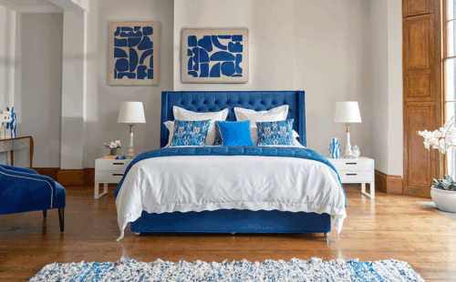 A bedroom interior featuring a Sleepeezee bed